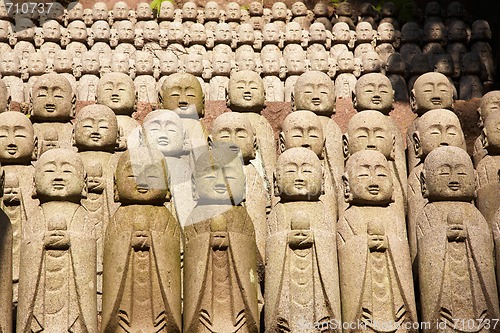 Image of Stone monks statues