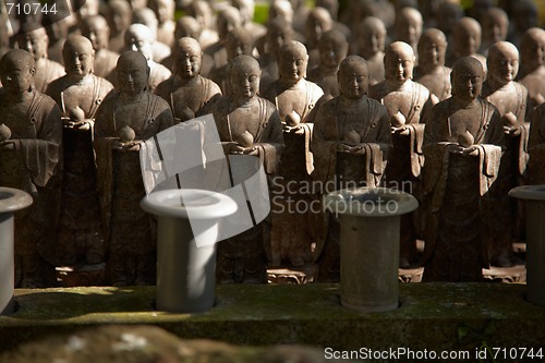 Image of Stone monks statues