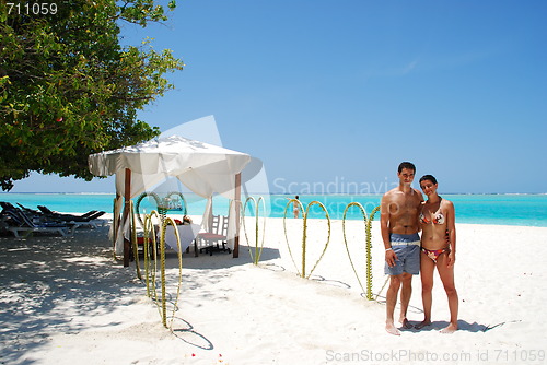 Image of Couple rehearsal to get married on a tropical island