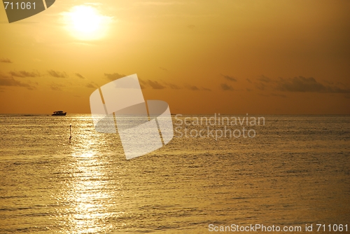 Image of Beautiful orange sunset on a tropical beach