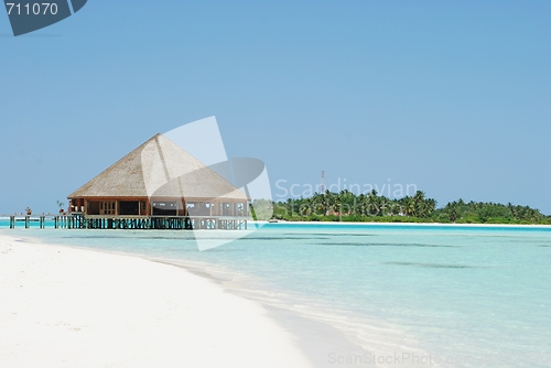 Image of Bungalow's architecture and beach on a Maldivian Island