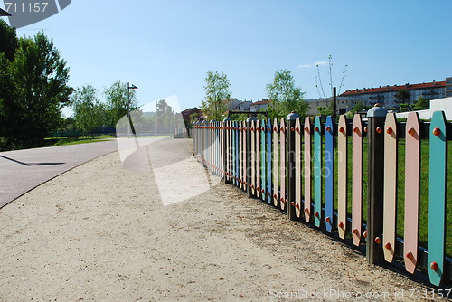 Image of Colored fence on a park