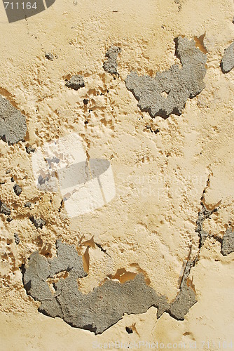 Image of Yellow wall peeling