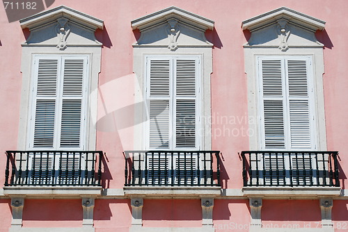 Image of Ancient facade and windows of a typical building