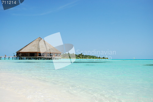 Image of Bungalow's architecture and beach on a Maldivian Island