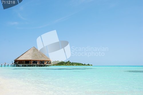 Image of Bungalow's architecture and beach on a Maldivian Island