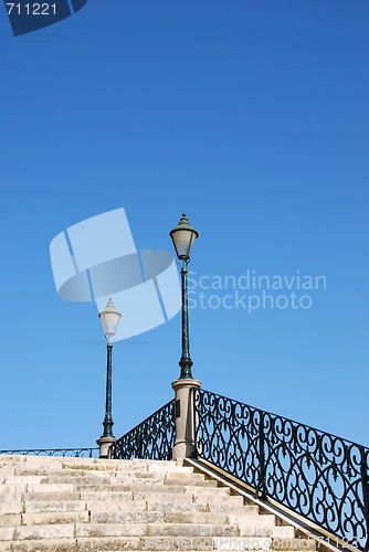 Image of Vintage stairway with traditional lamp post (blue sky)