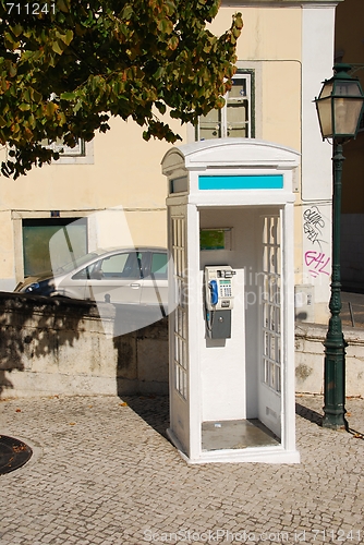 Image of White portuguese telephone booth in Lisbon