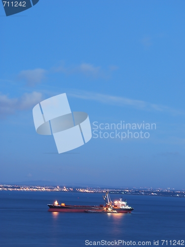 Image of Container ship during sunset