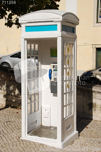 Image of White portuguese telephone booth in Lisbon