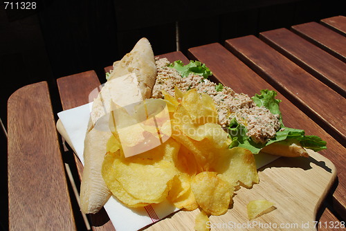 Image of Tuna sandwich with beach front