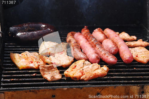 Image of Tasty meal with fresh meat on grill