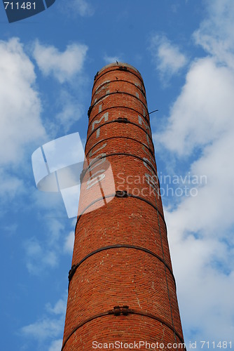 Image of Tall Brick Chimney (Dismantled Industry) with blue sky background