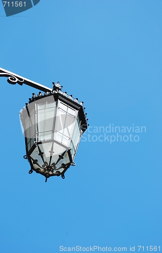 Image of Old lantern with sky background