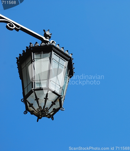 Image of Old lantern with sky background