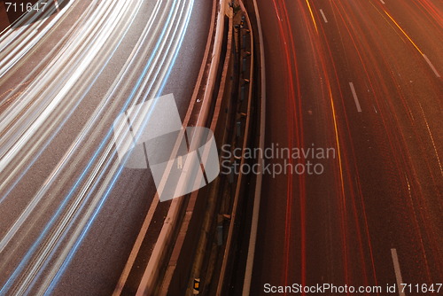 Image of Freeway traffic on the city (car blur motion)