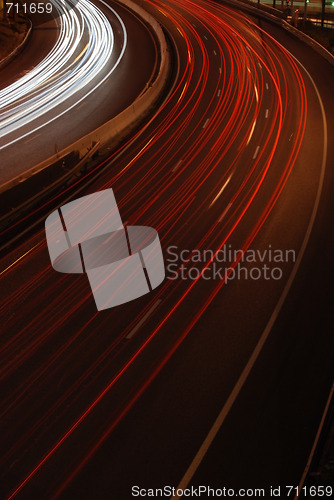 Image of Freeway traffic on the city (car blur motion)