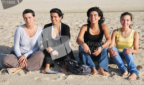 Image of Happy sisters at the beach