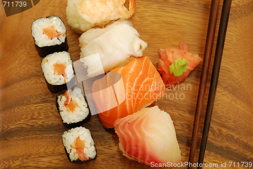 Image of Nigiri/Maki sushi meal (salmon, swordfish, shrimp, octupus)