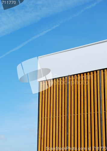 Image of Wooden structure against blue sky