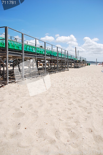 Image of Stadium green bleachers (space on sand)