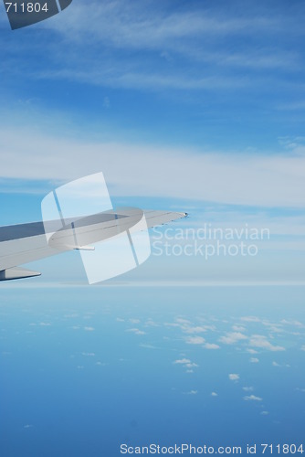 Image of Airplane wing view with gorgeous clouscape