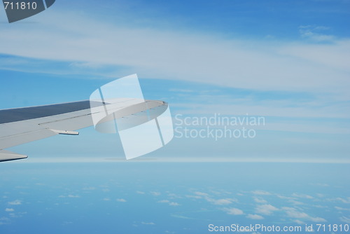 Image of Airplane wing view with gorgeous clouscape