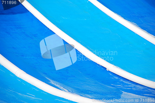 Image of Blue waterslide in a water park