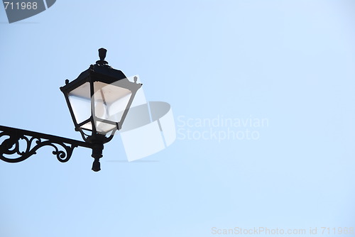 Image of Old lantern with sky background