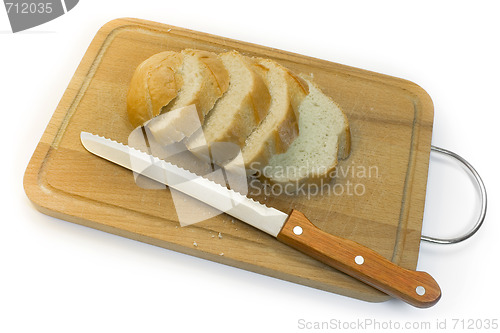 Image of Bread, chopping board and knife