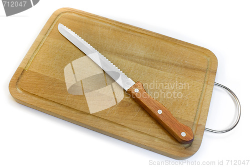 Image of Chopping board and knife for bread