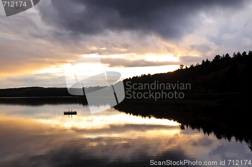 Image of Lake sunset over forest