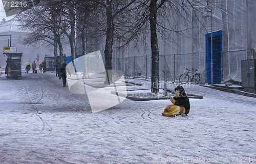 Image of Begging on the sidewalk