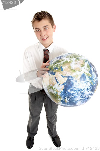 Image of School student holding the world in his hands