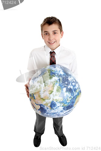 Image of Smiling boy holding the world earth