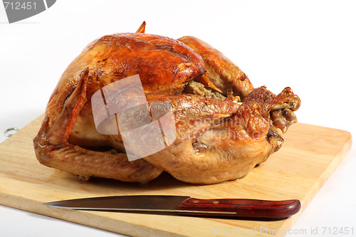 Image of Roast turkey on a board