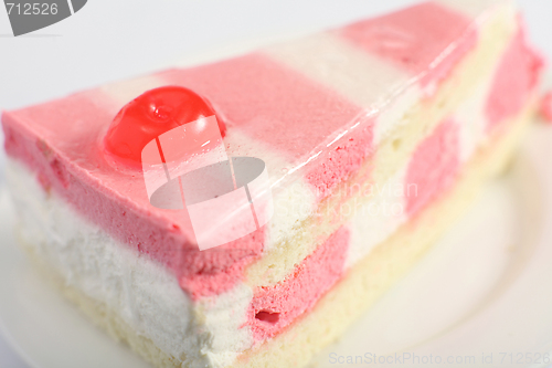 Image of A slice of strawberry and vanilla mousse cake