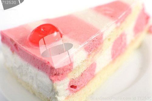 Image of A slice of strawberry and vanilla mousse cake