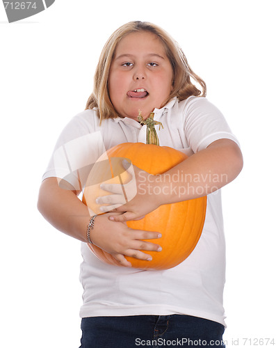 Image of Girl Holding Large Pumpkin