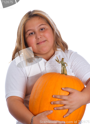 Image of Girl Holding Pumpkin