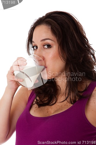 Image of Face of woman drinking milk