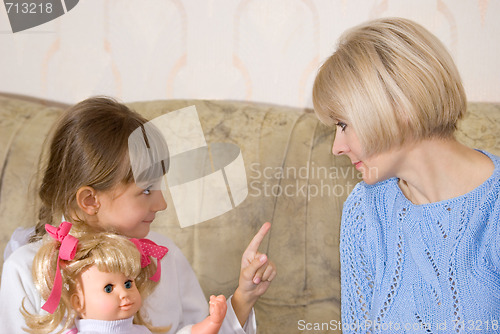 Image of Mum and daughter with a doll