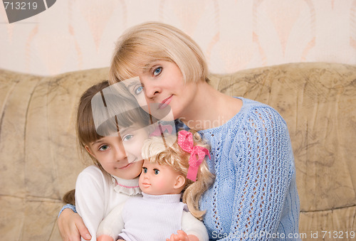 Image of Mum and daughter with a doll