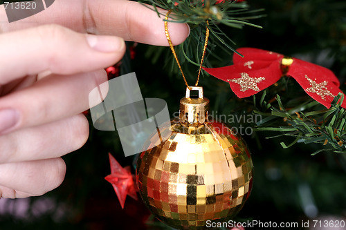 Image of Christmas ornaments on tree.