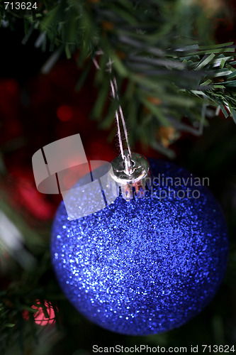 Image of Christmas ornaments on tree.