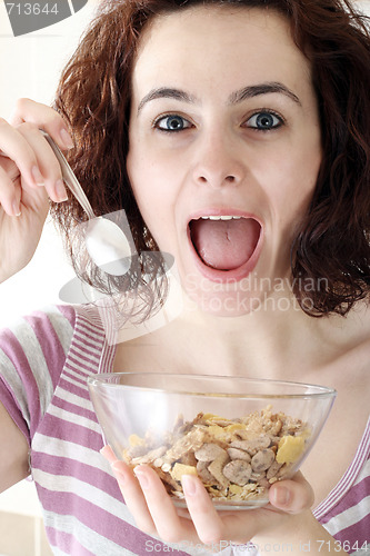 Image of Young people eating milk with cereals