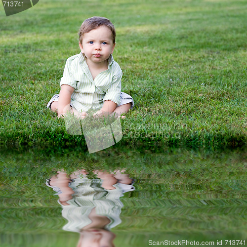 Image of Cute Baby in the Grass