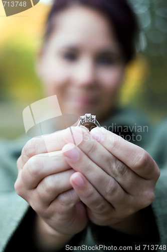 Image of Woman Holding a Ring
