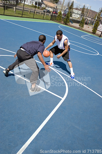 Image of Men Playing Basketball