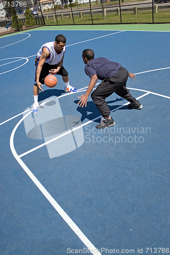 Image of Men Playing Basketball